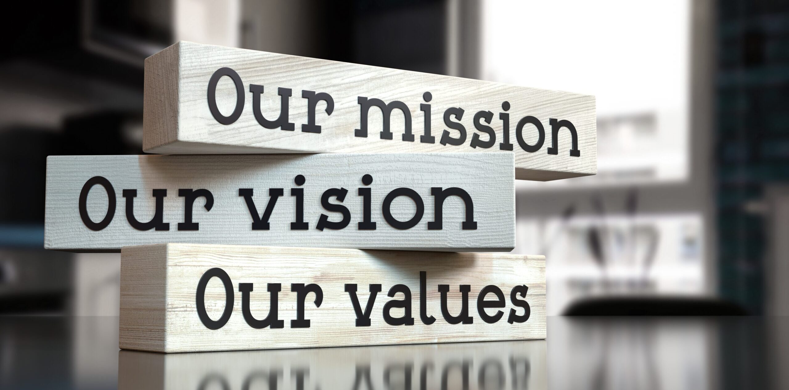 Our mission, vision, values – words on wooden blocks – 3D illustration